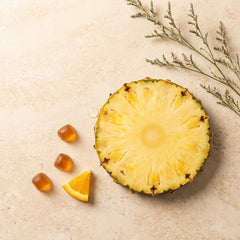 Pineapple and feminine balance gummies flat lay